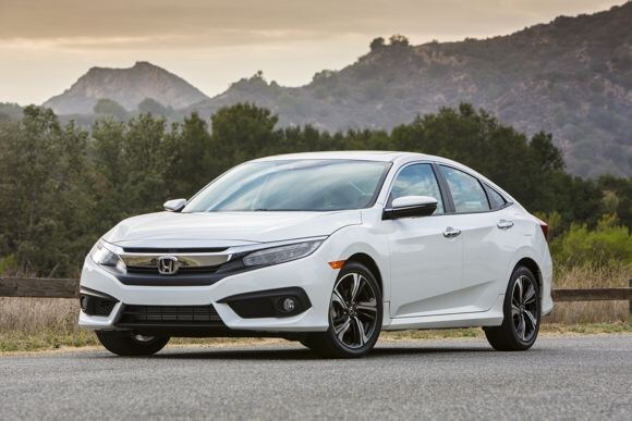 2016-honda-civic-first-review-oem-38-600-001