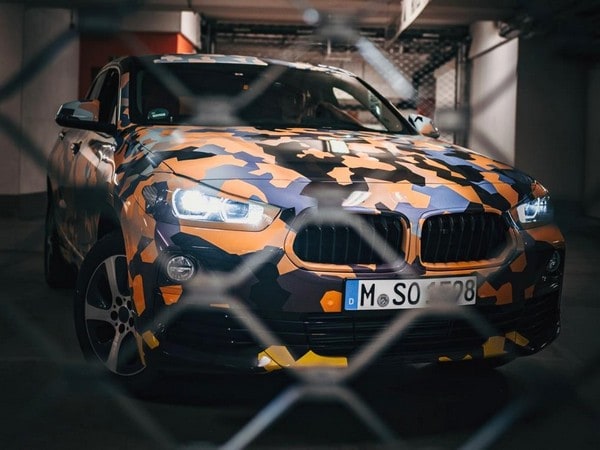 18-bmw-x2-camo-teaser-1
