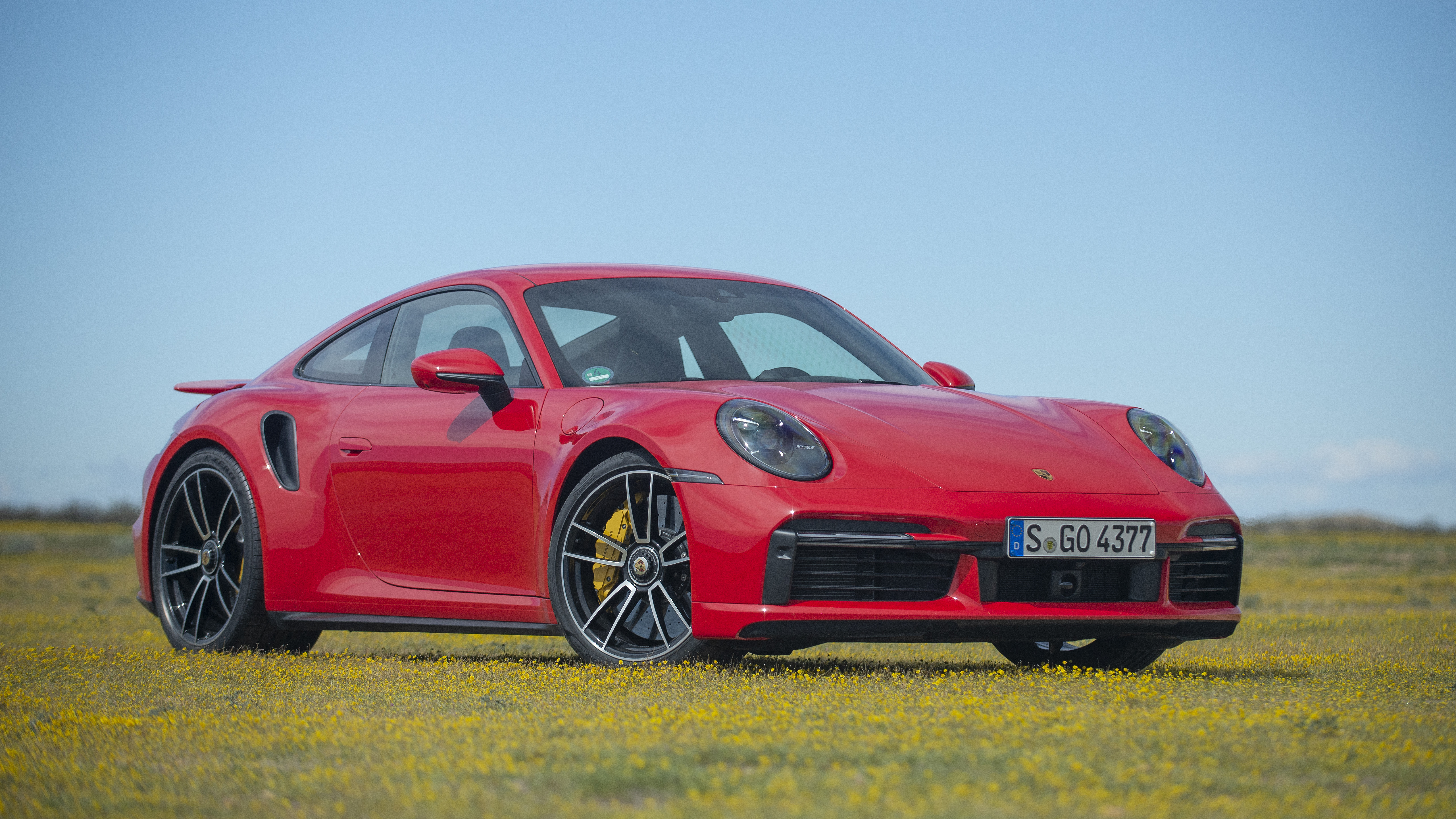 2021 Porsche 911 Turbo S Coupe Front Right Quarter On Flowers