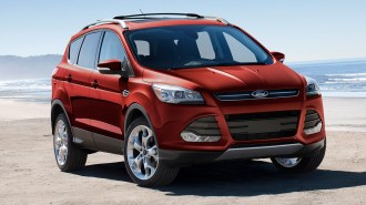 2015 Ford Escape in red.