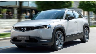 Mazda MX 30 Concept Driving Front Three Quarter