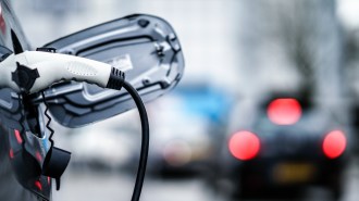 Electric vehicle with a charger attached.