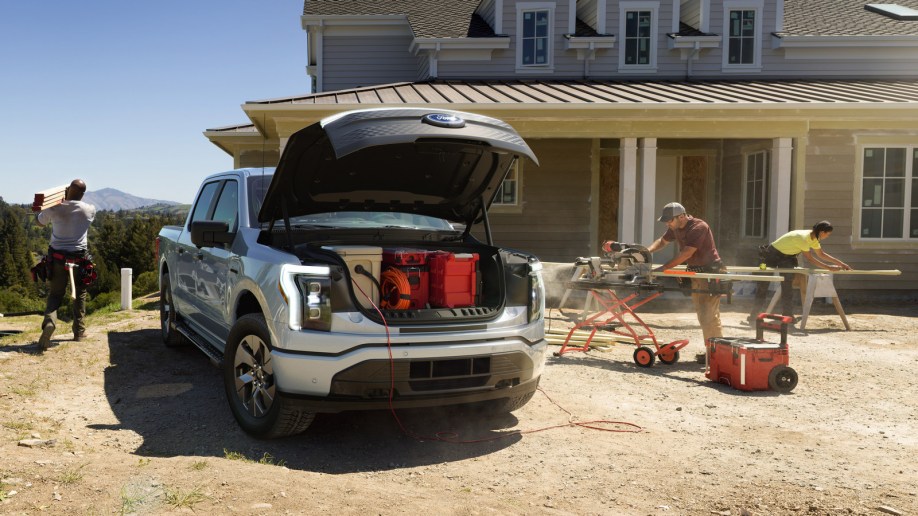 2022 Ford F-150 Lightning electric truck at jobsite with front trunk open