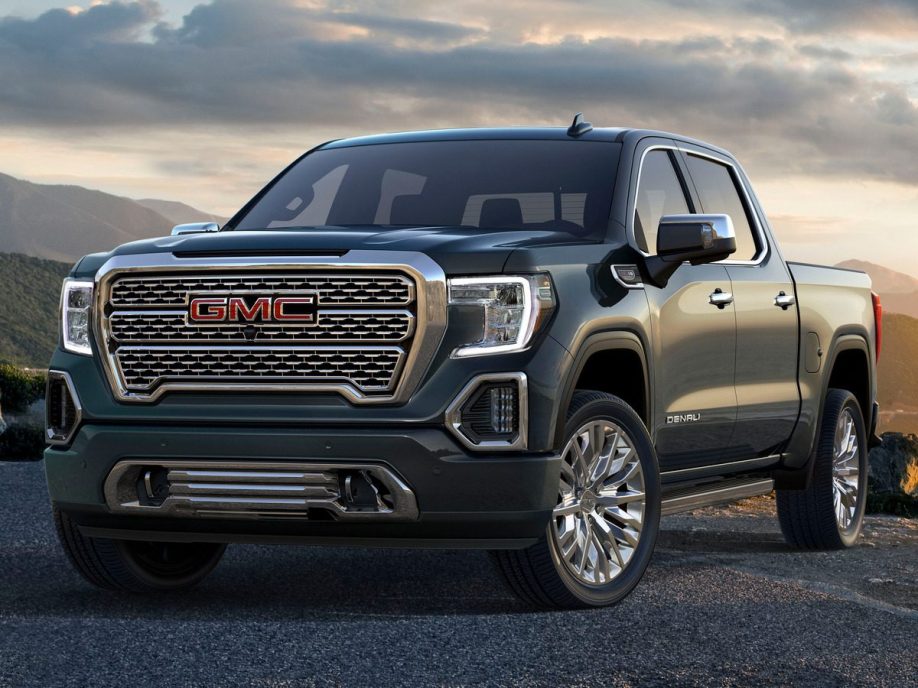 2021 GMC Sierra Denali with green hills