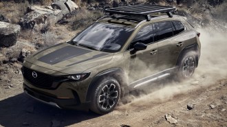 2023 Mazda CX 50 Driving Front Three Quarter