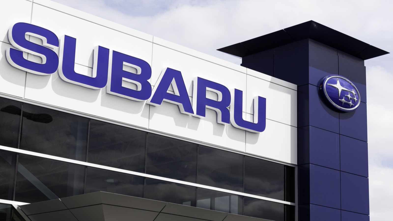 A Subaru sign on a dealership