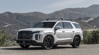 The 2023 Hyundai Palisade in white, seen from a front quarter angle