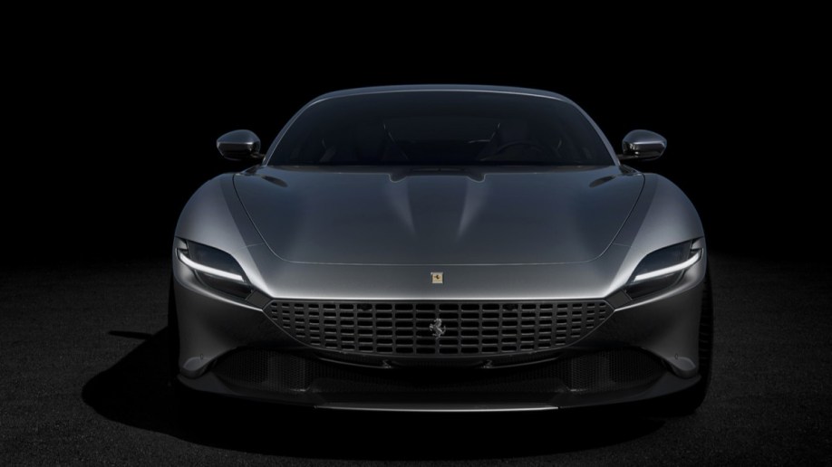 The 2022 Ferrari Roma in gray, seen from head-on