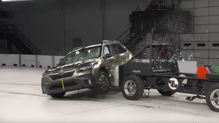 The 2022 Subaru Outback undergoes side-impact crash testing at an Insurance Institute for Highway Safety laboratory. We see the test sled crashing into the side of the Outback, which earned a score of "Good."