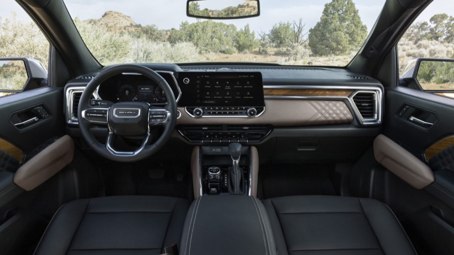 The 2023 GMC Canyon Denali's tri-tone interior, with wood trim and tan and black leather