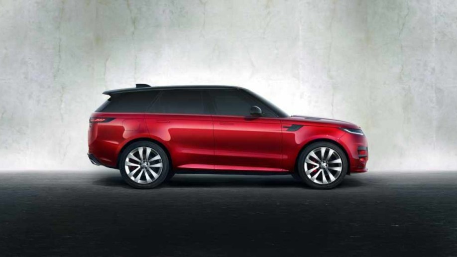 The 2023 Range Rover Sport in red, seen in profile