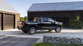 The 2024 Chevrolet Silverado seen from a rear quarter angle