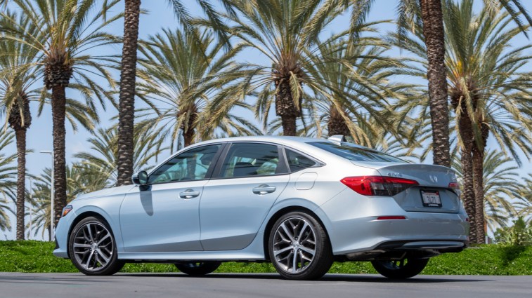 Silver 2022 Honda Civic Sedan near palm trees