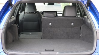 2023 Lexus UX 250h F Sport rear cargo with seat folded.