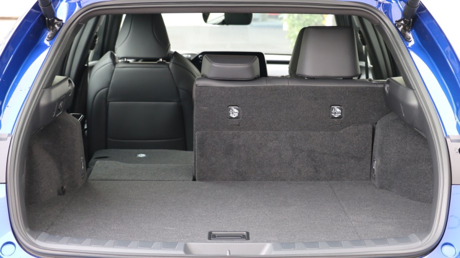 2023 Lexus UX 250h F Sport rear cargo with seat folded.