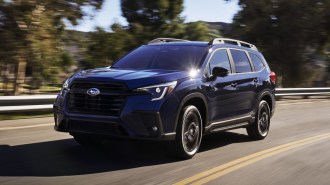 2023 Subaru Ascent driving on highway.