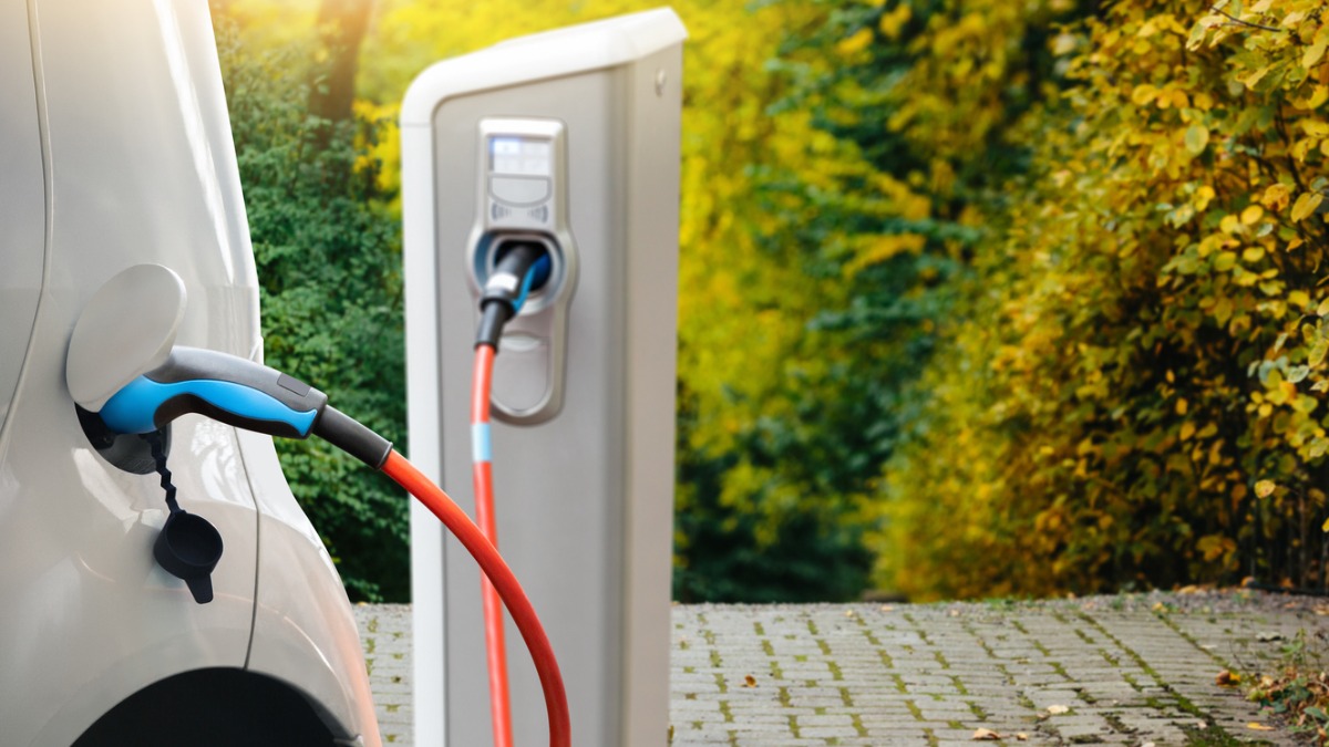 An EV plugged in to charge