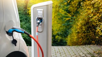An EV plugged in to charge