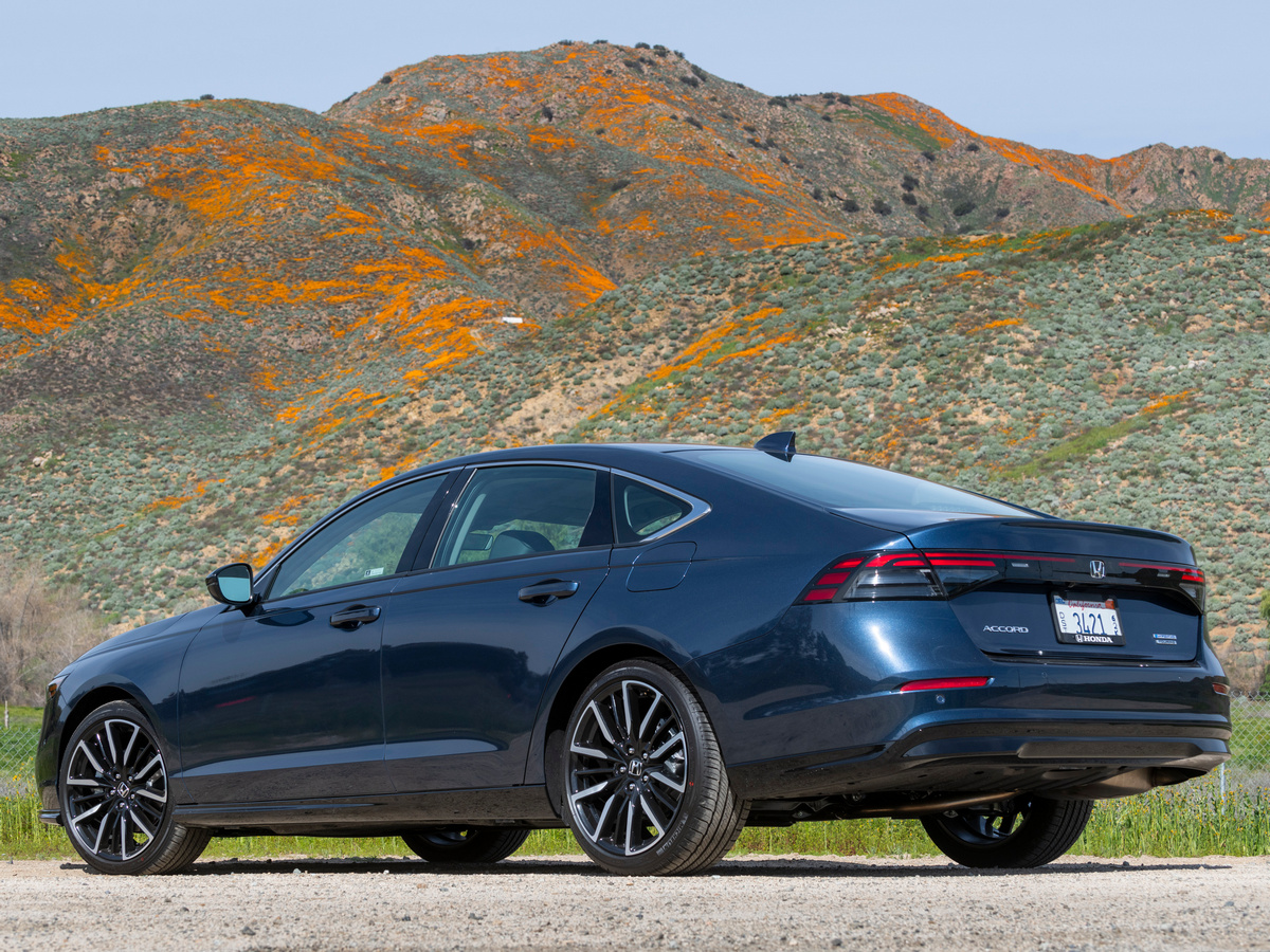 Blue 2023 Honda Accord Hybrid in near hills.