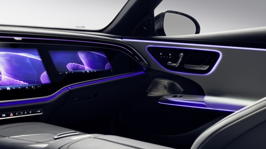 The passenger screen and ambient lighting of the 2024 Mercedes-Benz E-Class