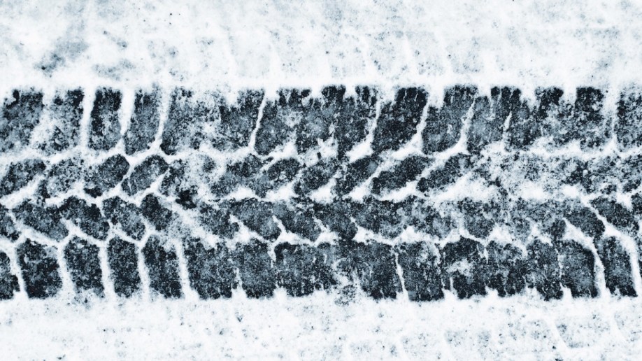 Winter tire tread on snowy surface