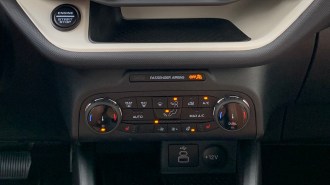2023 Ford Bronco Sport Heritage Edition climate controls and storage cubby.