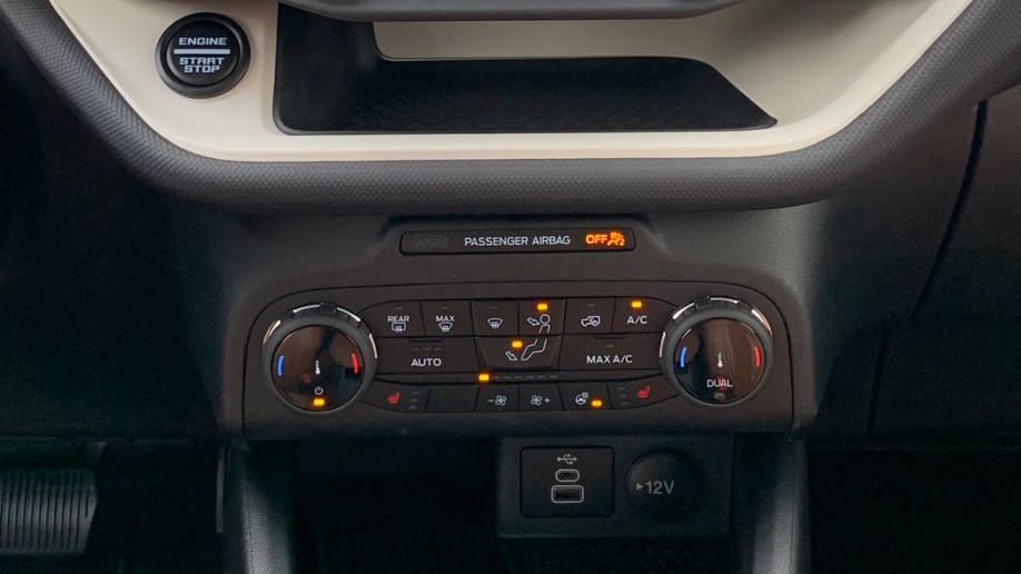 2023 Ford Bronco Sport Heritage Edition climate controls and storage cubby.