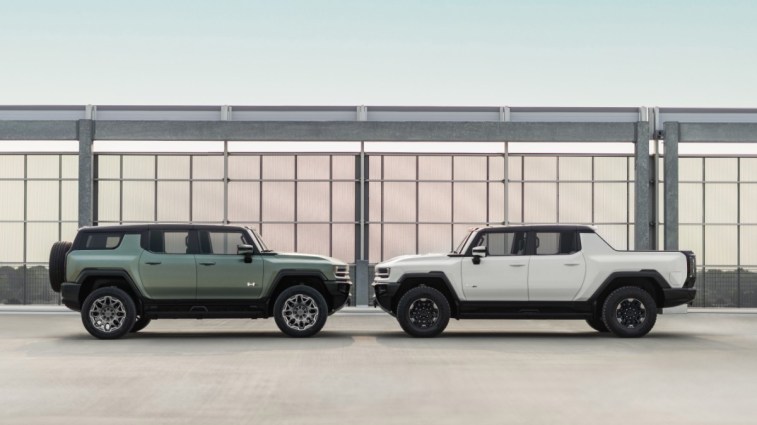 The 2023 GMC Hummer EV pickup and SUV face each other