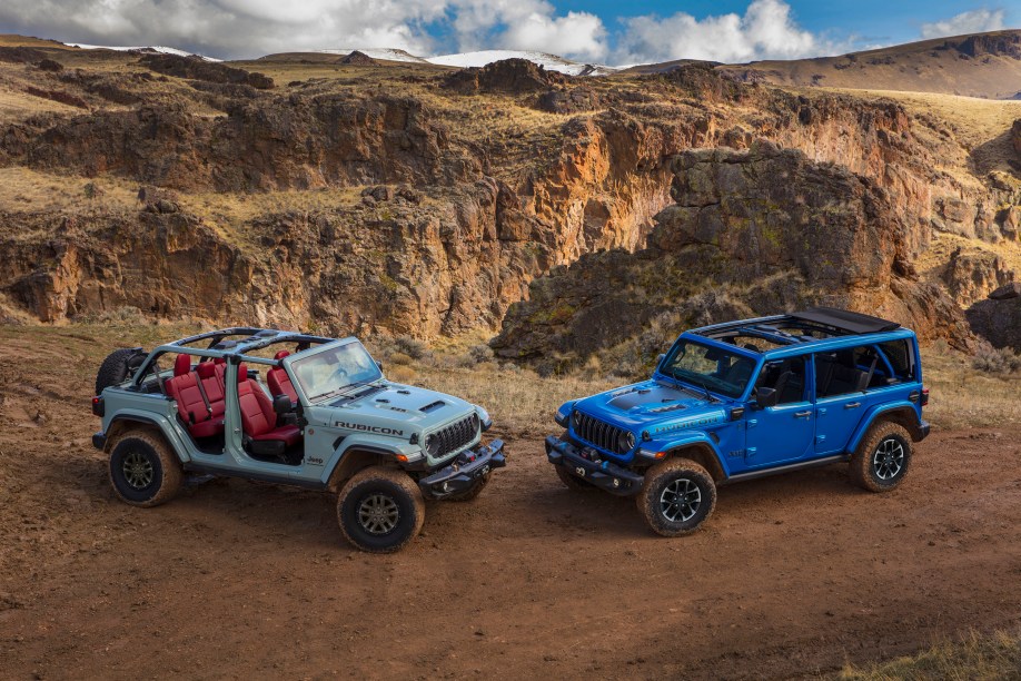 A pair of redesigned 2024 Jeep Wranglers showing roof options