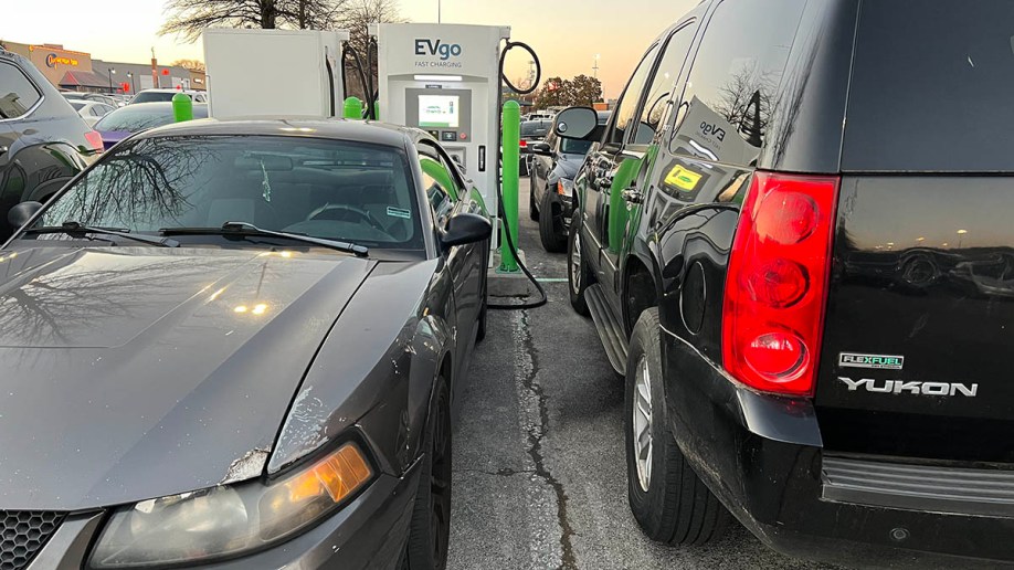 Gas-powered cars blocking an electric car charging station.
