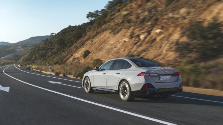 The 2024 BMW 5 Series seen from a rear quarter angle