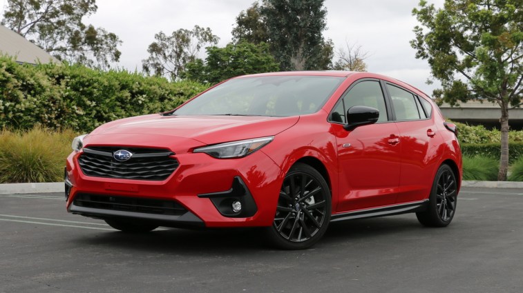 Red 2024 Subaru Impreza RS hatchback