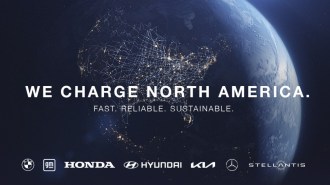 A graphic announcing that seven automakers will join together to build their own EV charging network