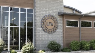 The United Auto Workers union logo on an office building