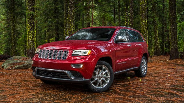 2015 Jeep Grand Cherokee Summit in red.