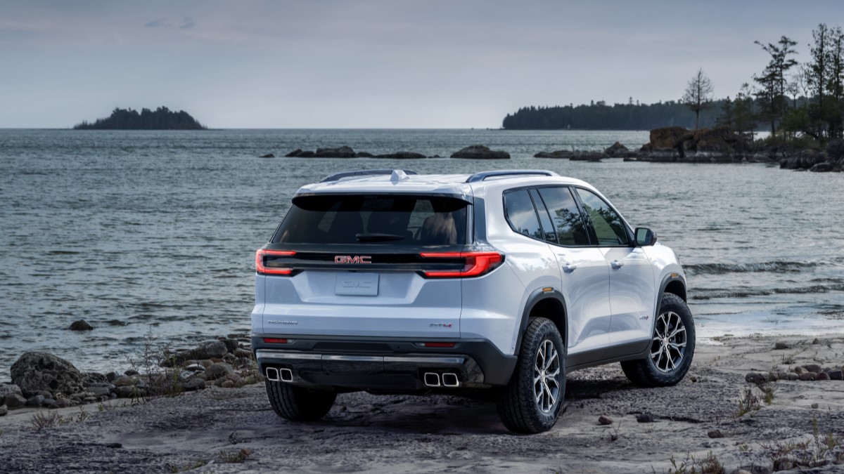 The 2024 GMC Acadia seen from a rear quarter angle