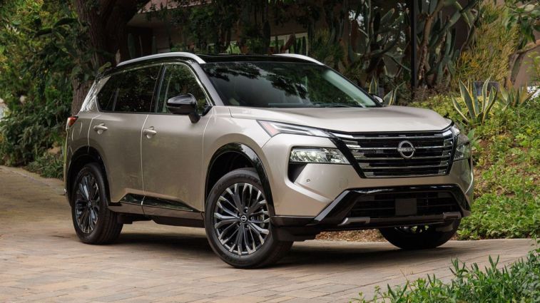2024 Nissan Rogue parked near a succulent garden.