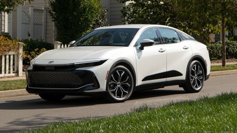 2024 Toyota Crown XLE in Oxygen White on a residential street.