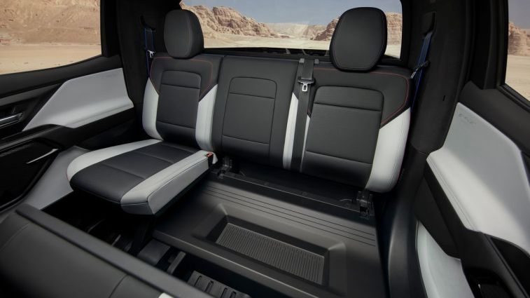 2024 Silverado EV RST rear under seat storage.