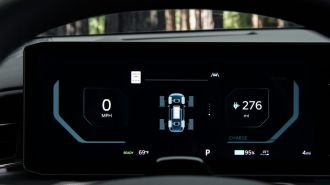 2024 Kia EV9 GT-Line driver info displaying range and mph.