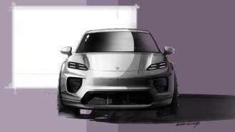 A sketch Porsche released showing the front-end view of the 2025 Porsche Macan EV