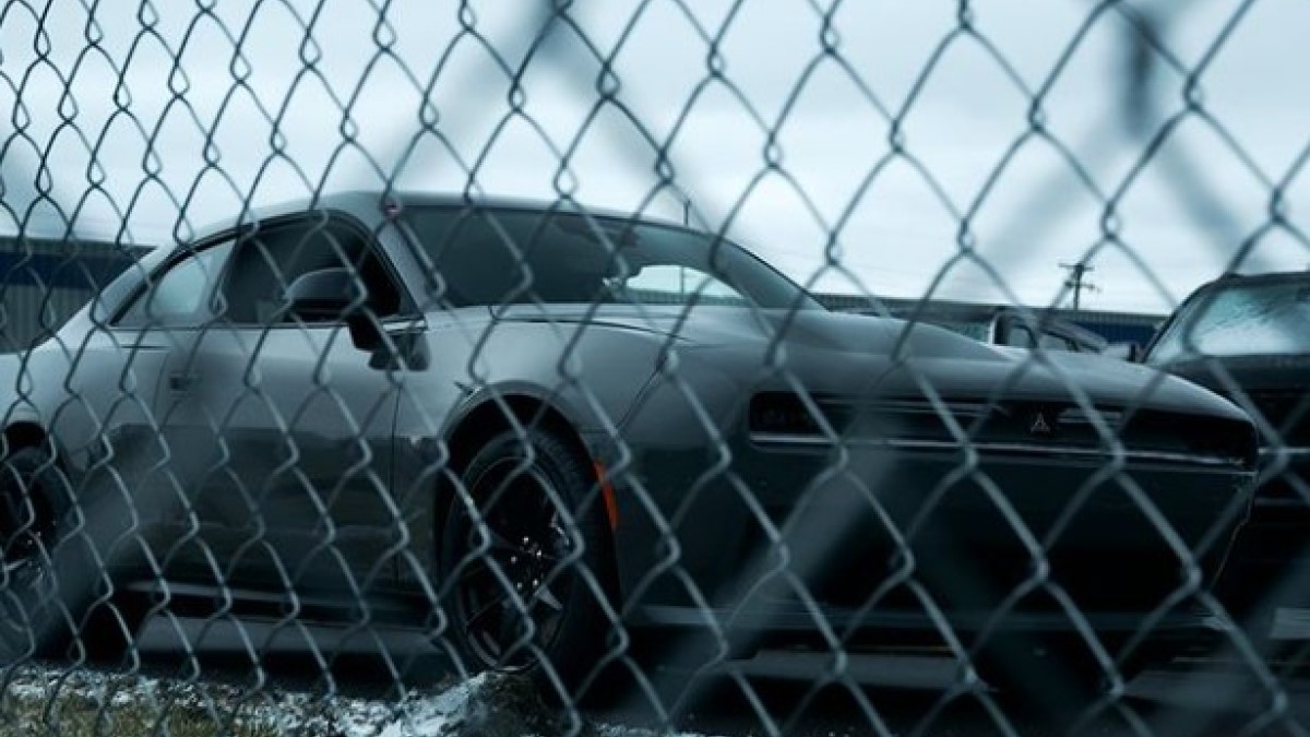 The Dodge Charger Daytona concept seen through a fence