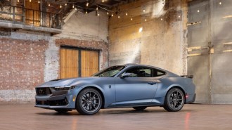 The 2024 Ford Mustang wrapped in Ford's Matte Film Wrap, seen in profile