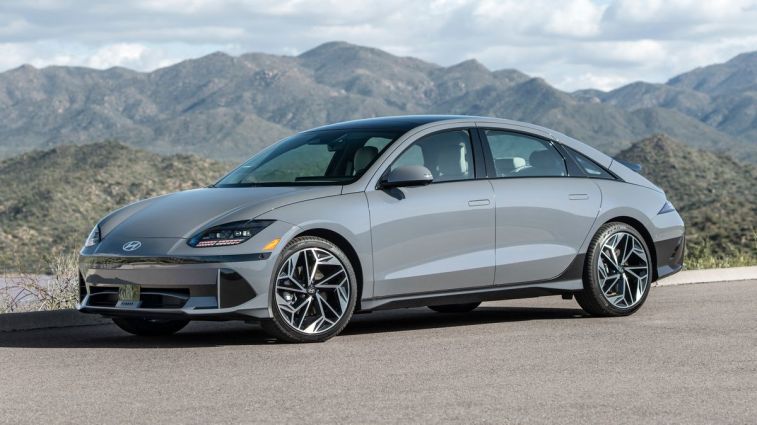 2024 Hyundai IONIQ6 Limited in grey with hills in the background.