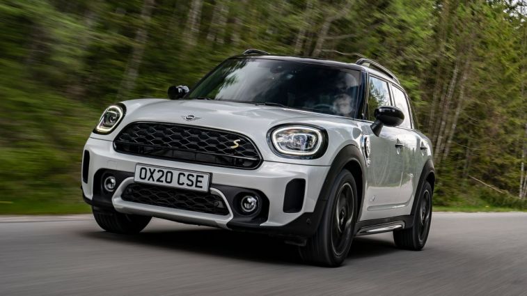 2024 Mini Countryman SE PHEV driving through a forest.