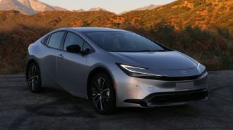 2024 Toyota Prius Limited in silver on GMR at sunset.