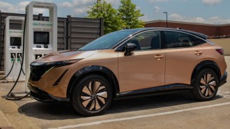 The 2024 Nissan Ariya plugged in to charge