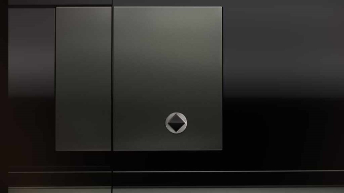 A teaser shot showing the badge of the 2025 Defender Octa