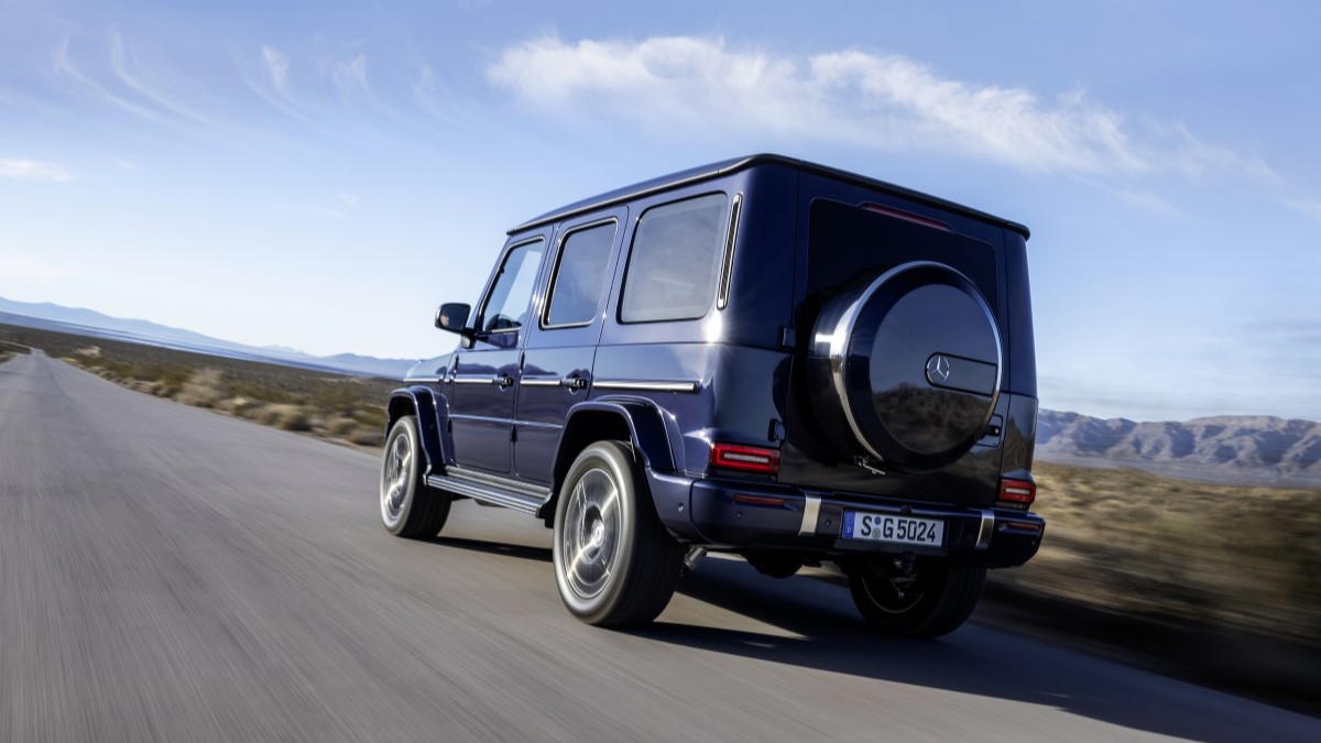 The 2025 Mercedes-Benz G-Class seen from a rear quarter angle