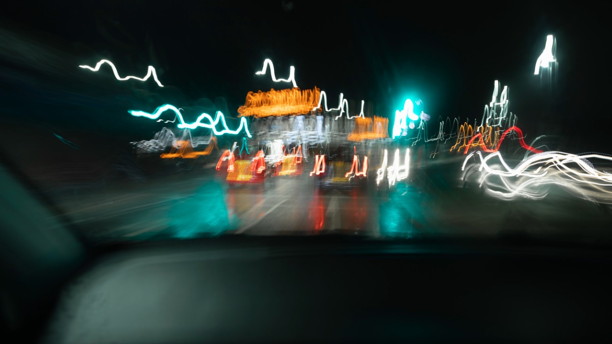Blurred and shaky car lights and traffic.